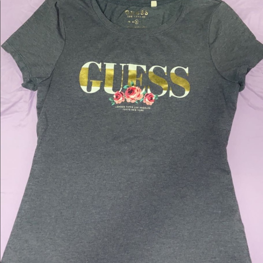 I am selling a guess shirt  in good condition.